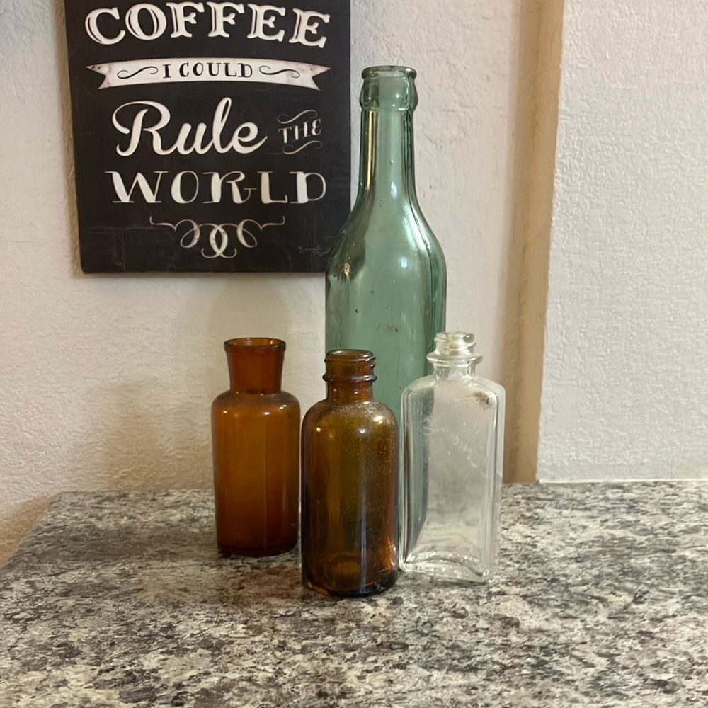 Vintage Glass Bottle Set in Green, Amber, and Clear
